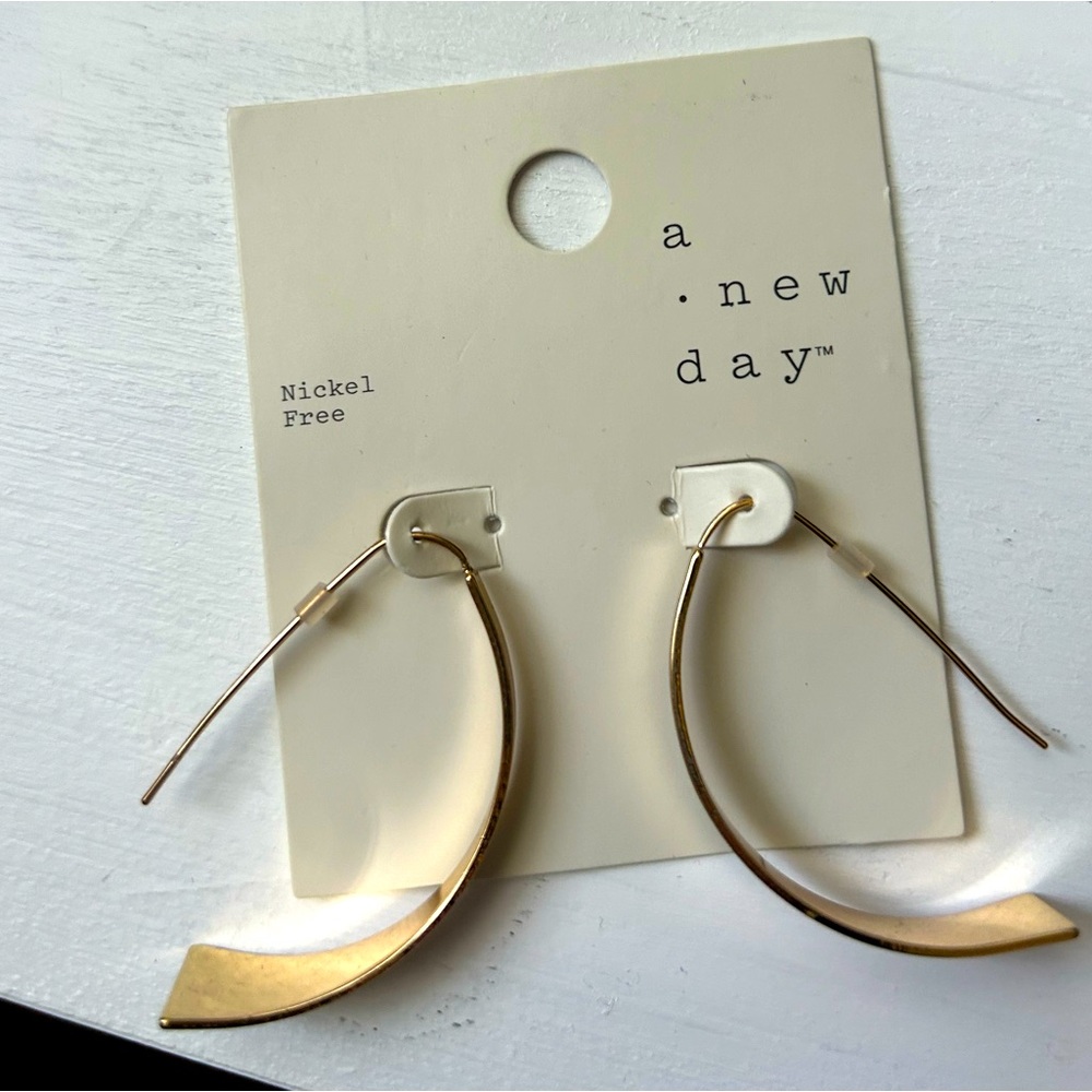 A• NEW DAY. Golden earrings.